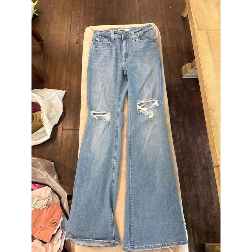 Levi’s 726 distressed light wash flare